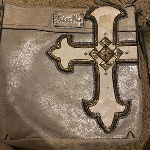 Miss me purse the paint is in bad condition
